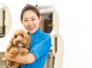 Jenifer with groomed dog
